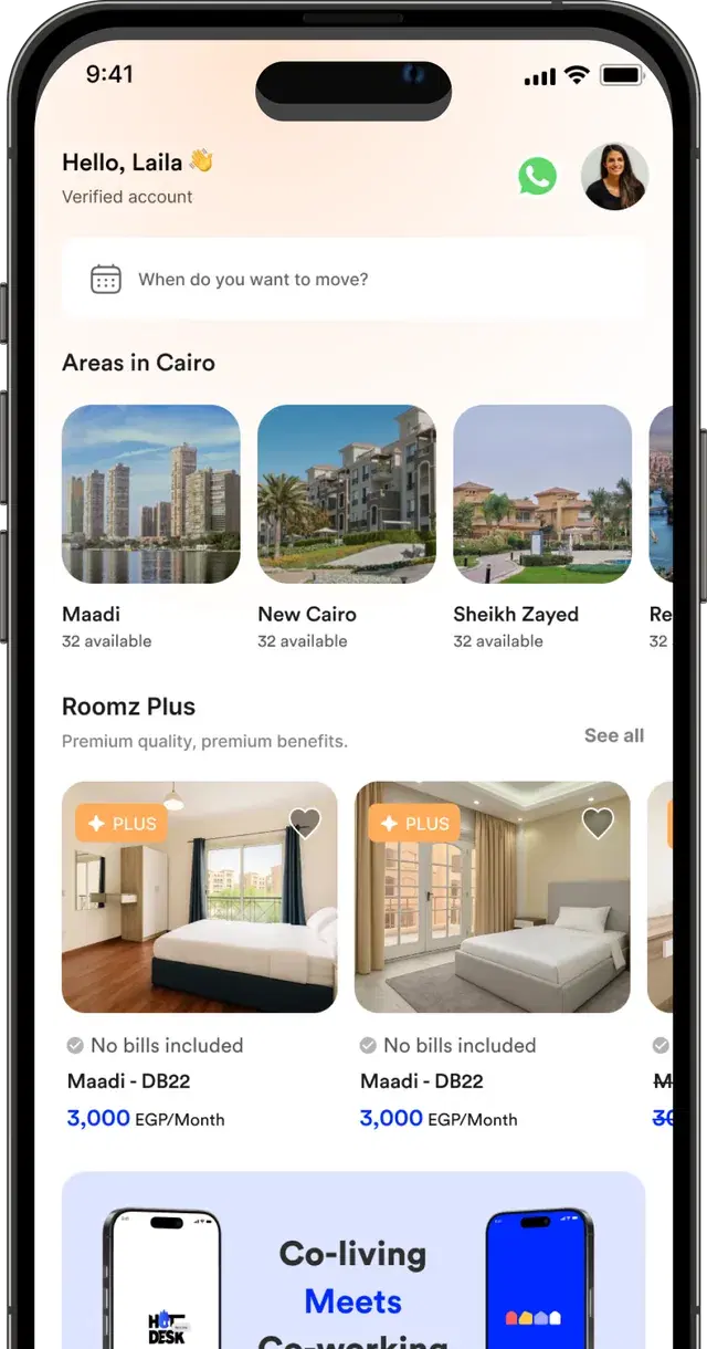 الشاشة الرئيسية لتطبيق Roomz.rent وتظهر بها مناطق القاهرة وغرف Roomz Plus